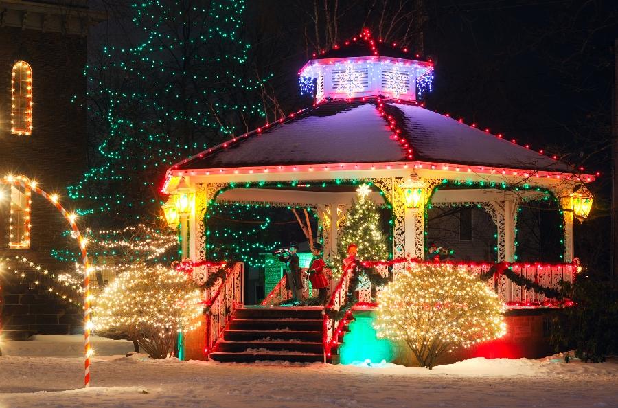 A small town Christmas display centered around the village gazebo
